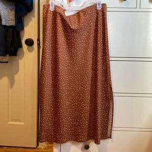 Brand new, never worn dark orange/tan polka dot silk midi skirt